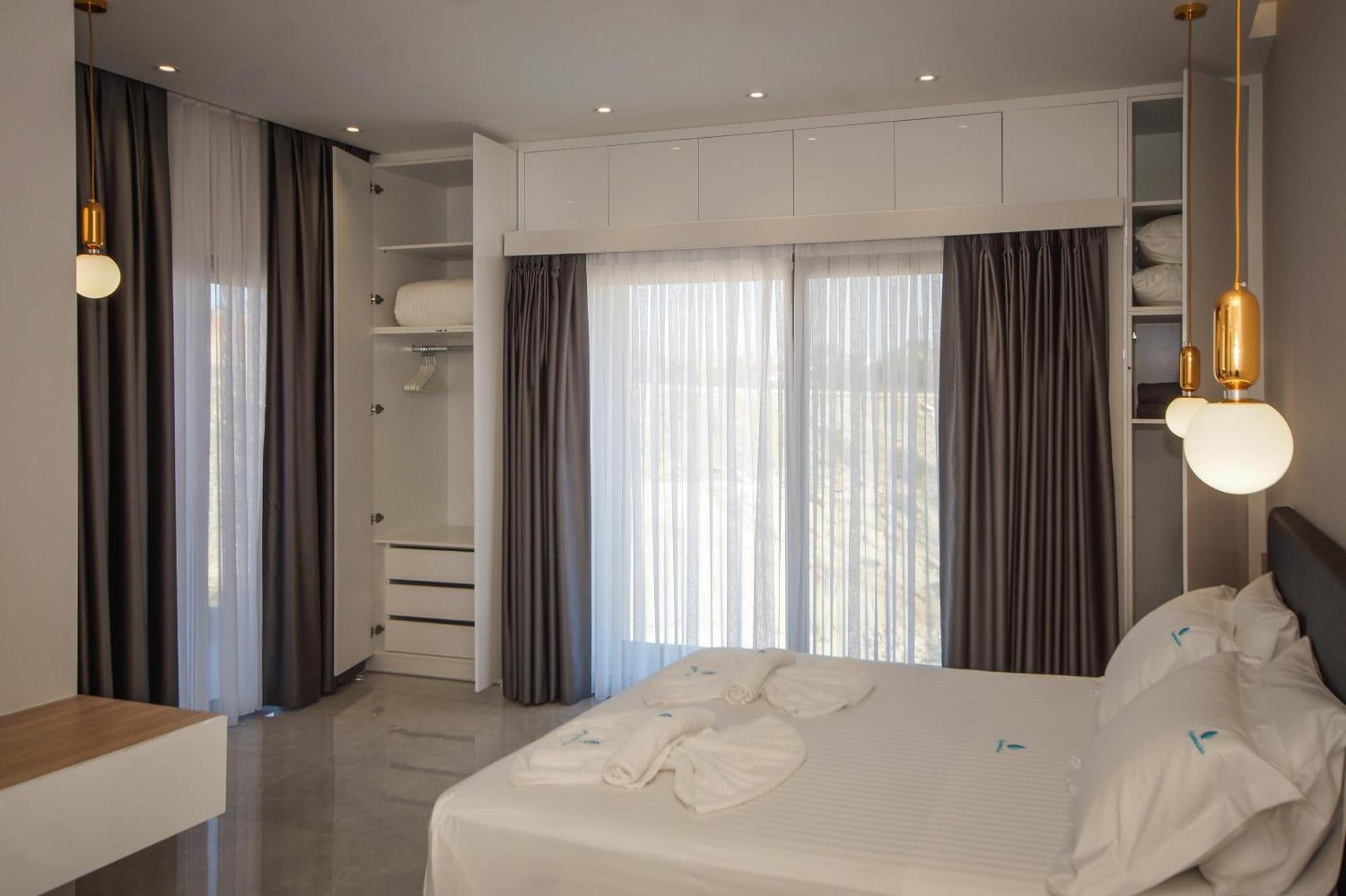 Aquamarine Luxury Suites Archangelos  Exterior photo